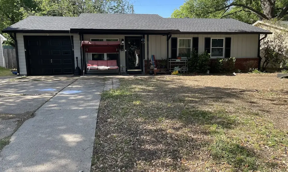 Asphalt Shingle Roof Repair crew at work on a residential roof in Statesboro
